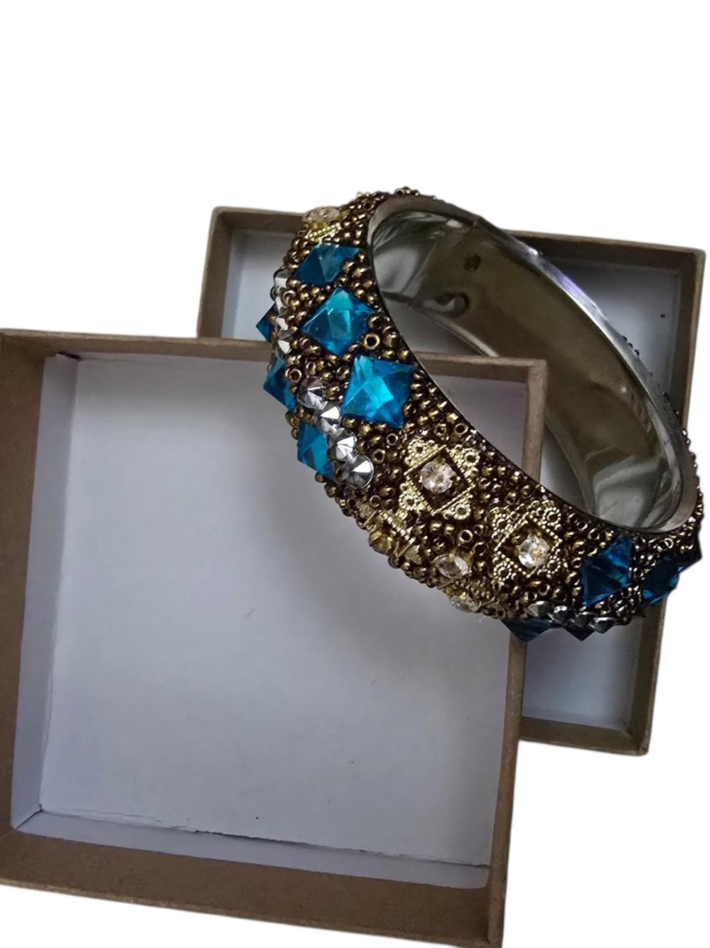 Gold-Tone Bangle Bracelet with Blue Crystal Accents